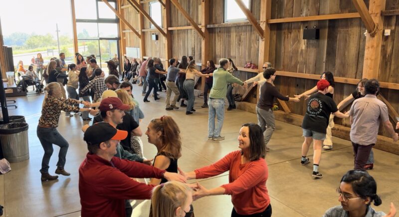 Image of people dancing at the Hay Barn