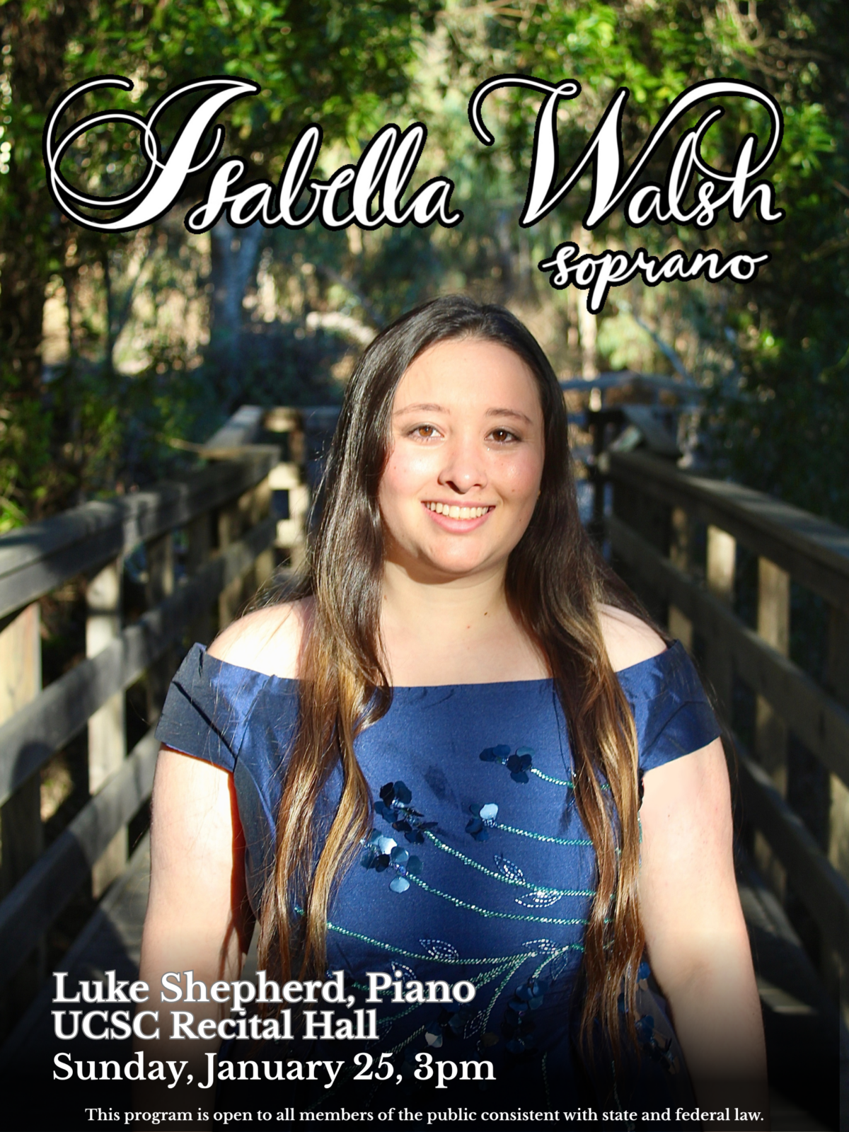 photo of the artist, Isabella Walsh, soprano, in a blue top, smiling with green foliage in the background