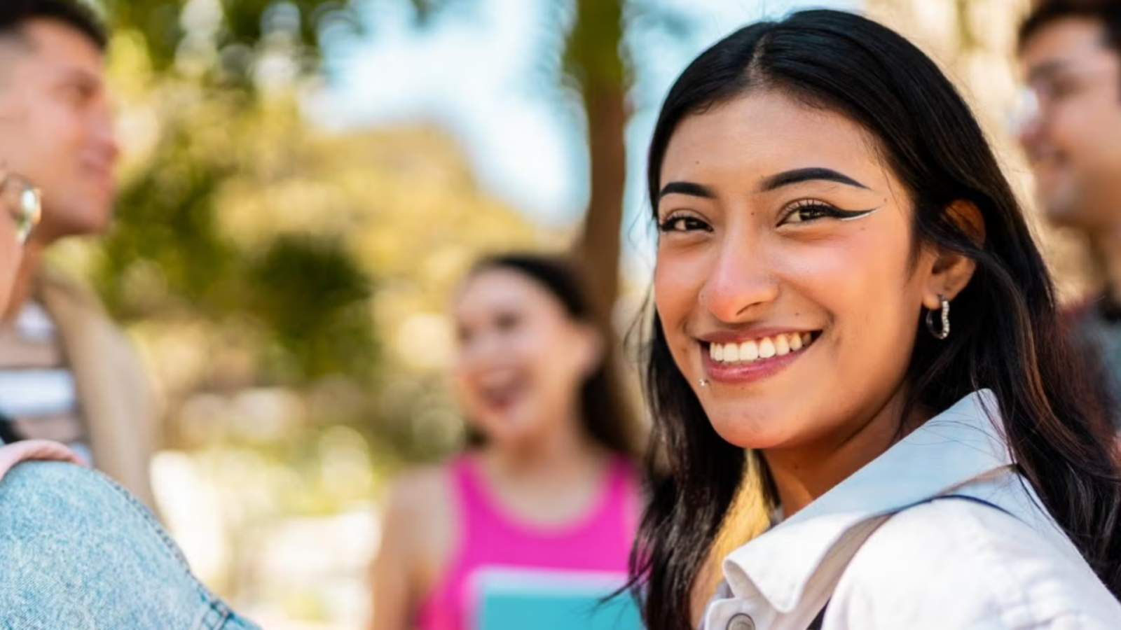 Woman smiling at camera.