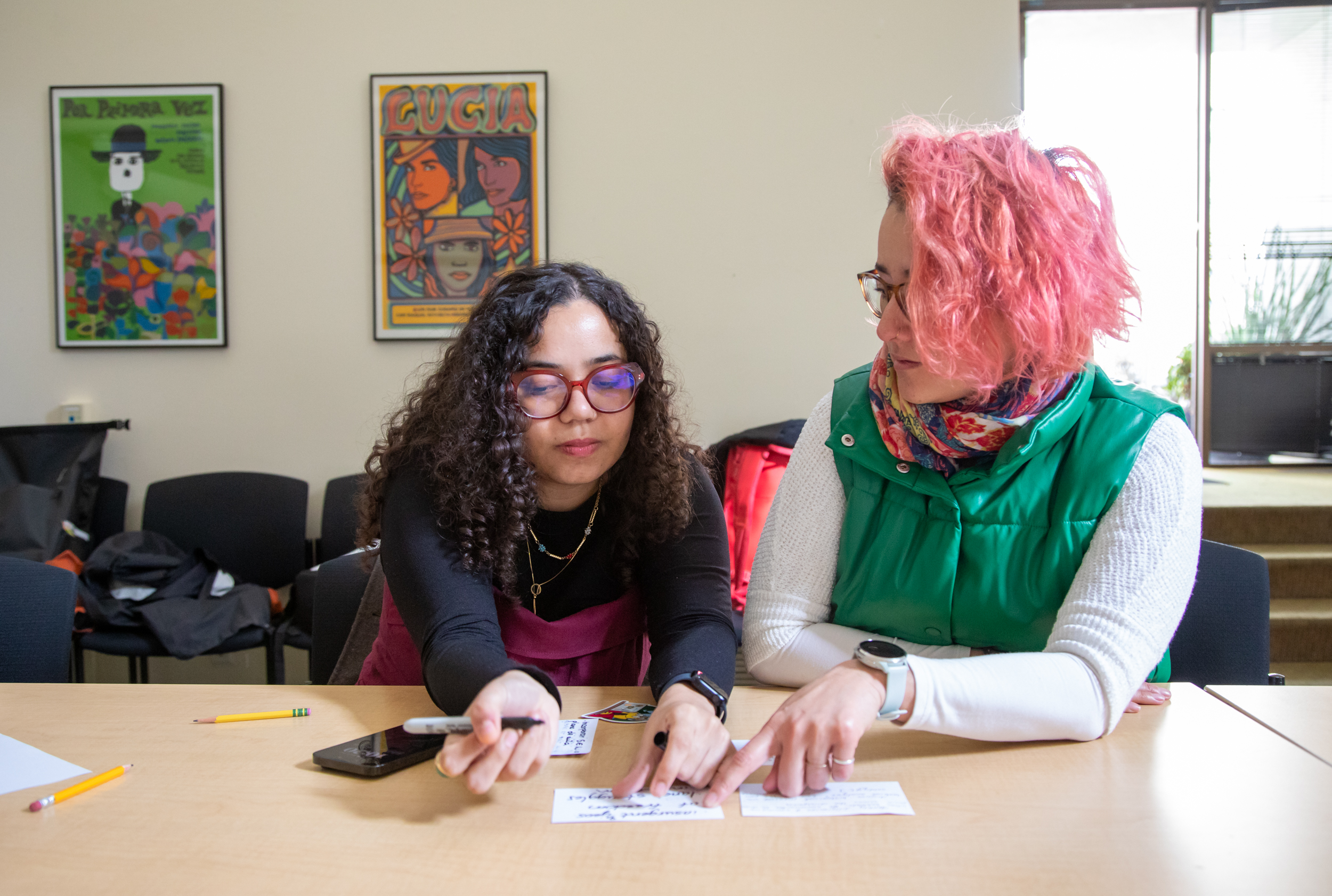 two phd students working on research project